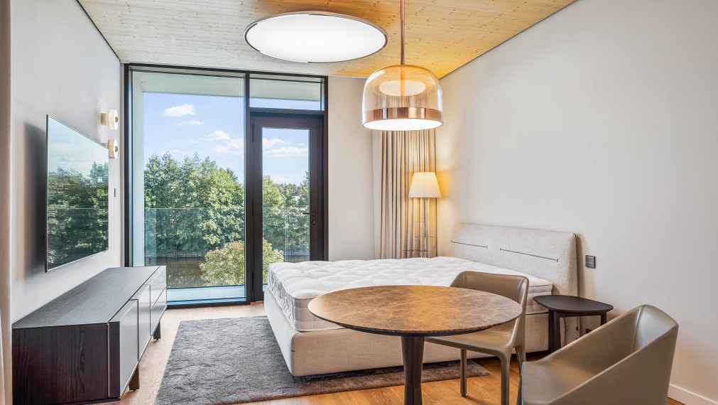 Luxury apartment by the lake with a private beach.