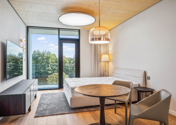 Luxury apartment by the lake with a private beach.